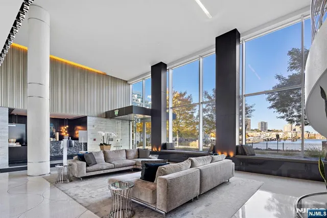 a view of a terrace with chairs and a table and chairs