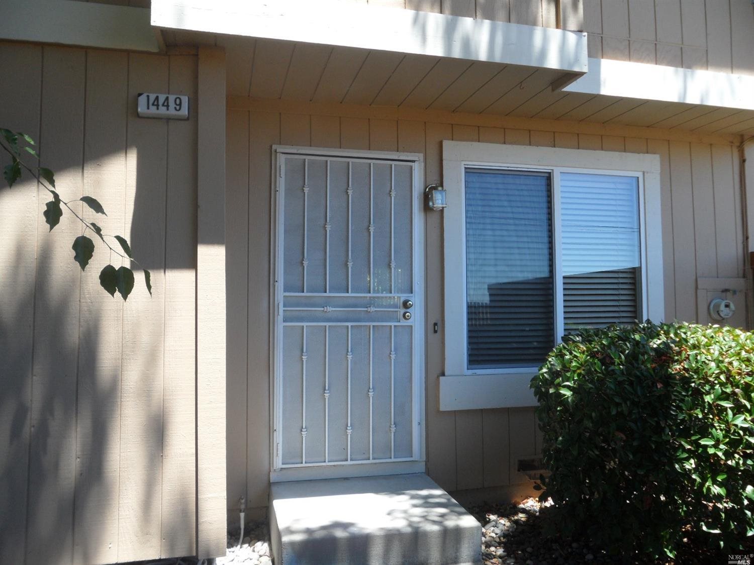 1449 Gold Way Rohnert Park, CA 94928 - Photo 1 of 1 a front view of a house with a garage