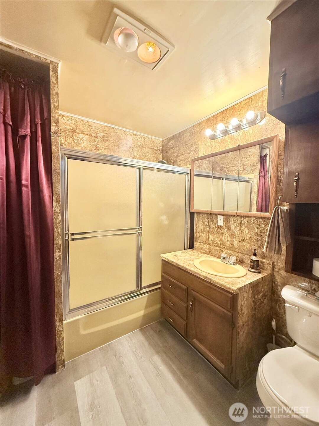1092 Aeneas Valley Road Tonasket, WA 98855 - Photo 27 of 40 a bathroom with a sink a toilet and shower