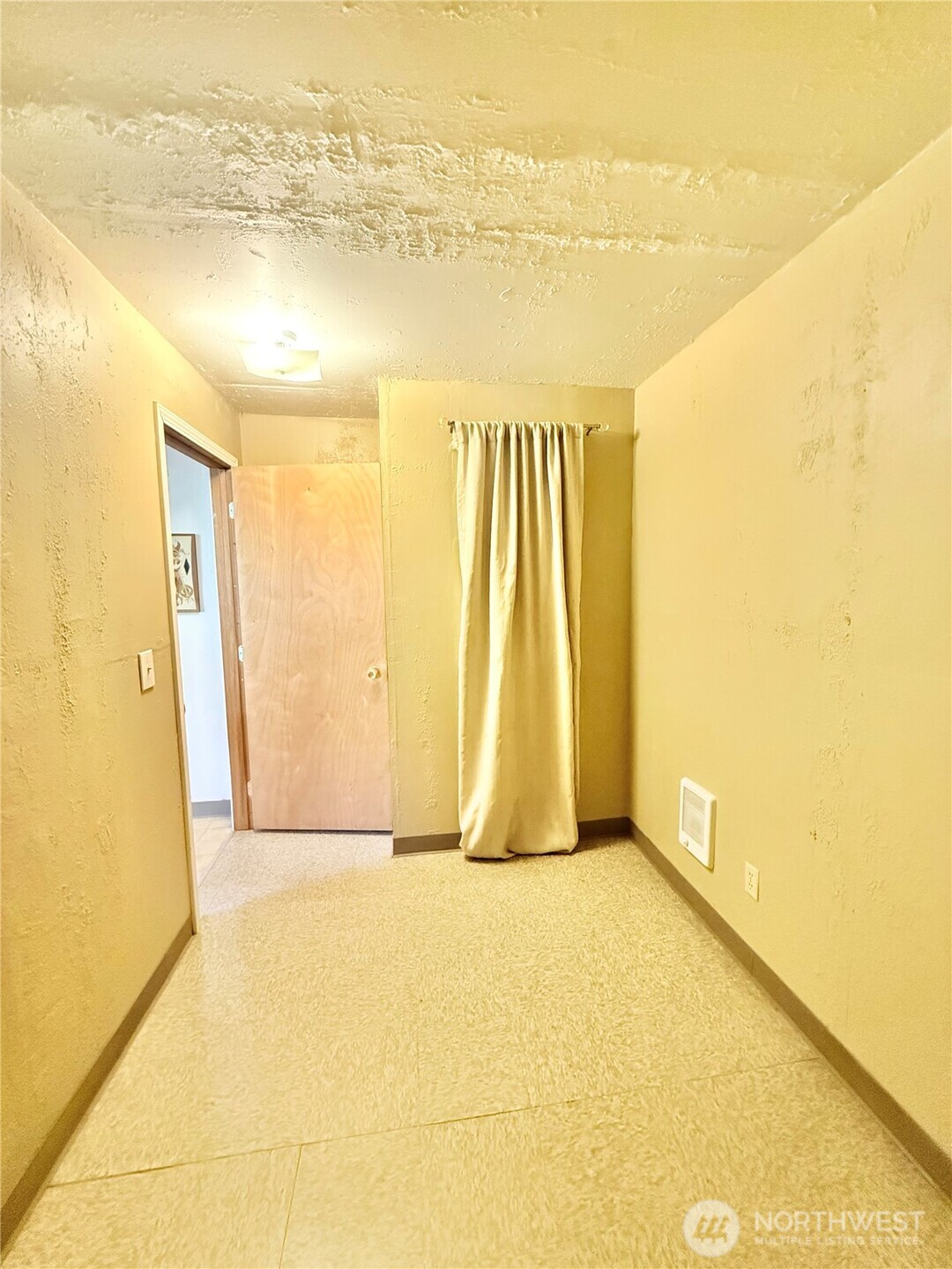 1092 Aeneas Valley Road Tonasket, WA 98855 - Photo 32 of 40 a view of a room with wooden floor