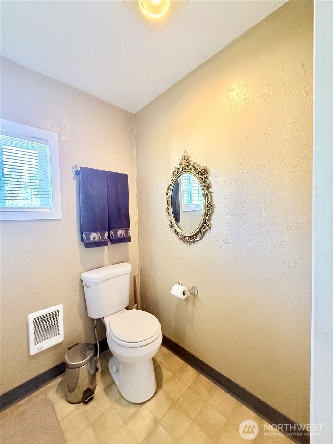 1092 Aeneas Valley Road Tonasket, WA 98855 - Photo 35 of 40 a bathroom with a toilet a sink and mirror