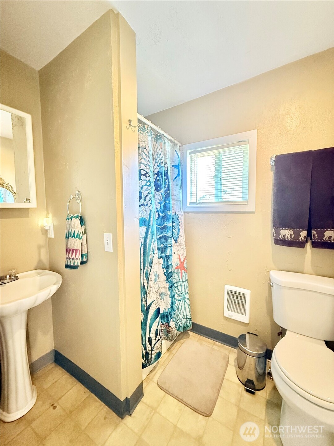 1092 Aeneas Valley Road Tonasket, WA 98855 - Photo 36 of 40 a bathroom with a sink toilet and shower