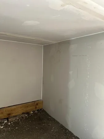 a view of a room with rack on the wall