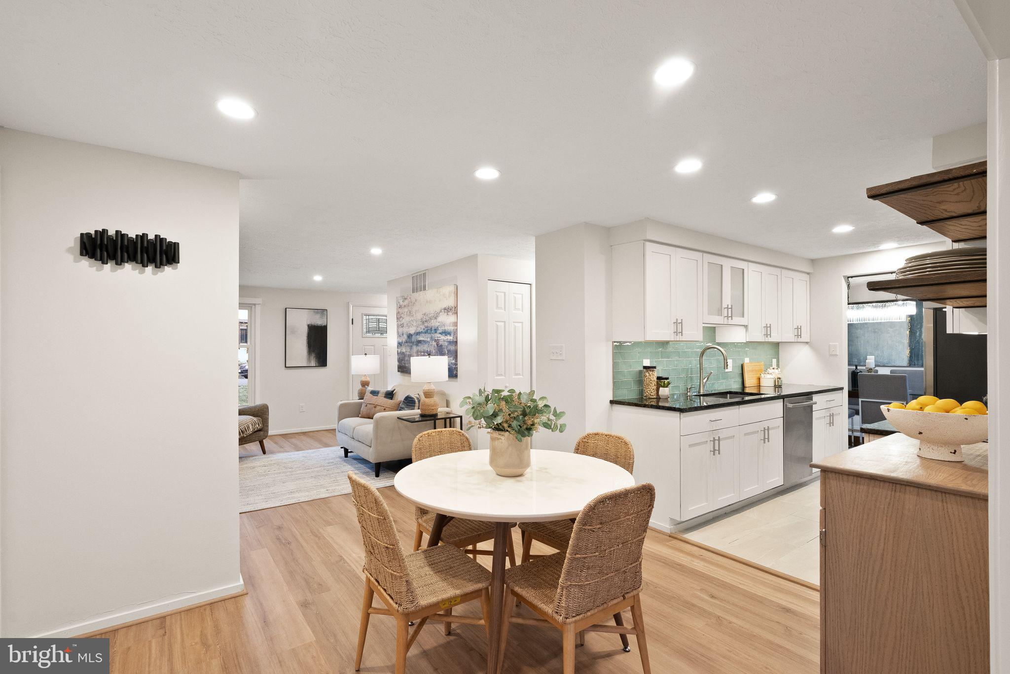 2420 Freetown Drive Reston, VA 20191 - Photo 12 of 58 Breakfast area opens to garage door