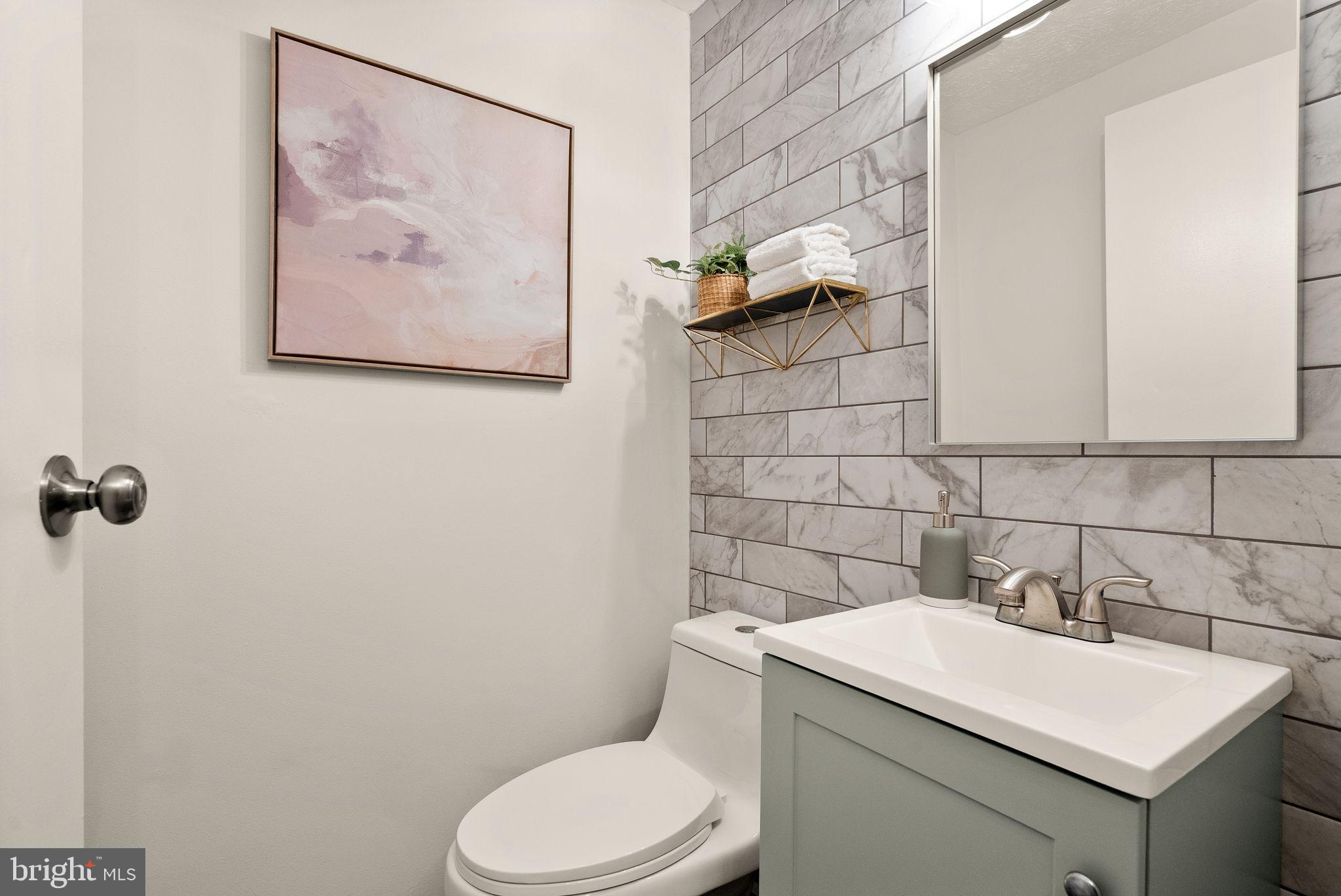 2420 Freetown Drive Reston, VA 20191 - Photo 18 of 58 Main level powder room fully updated