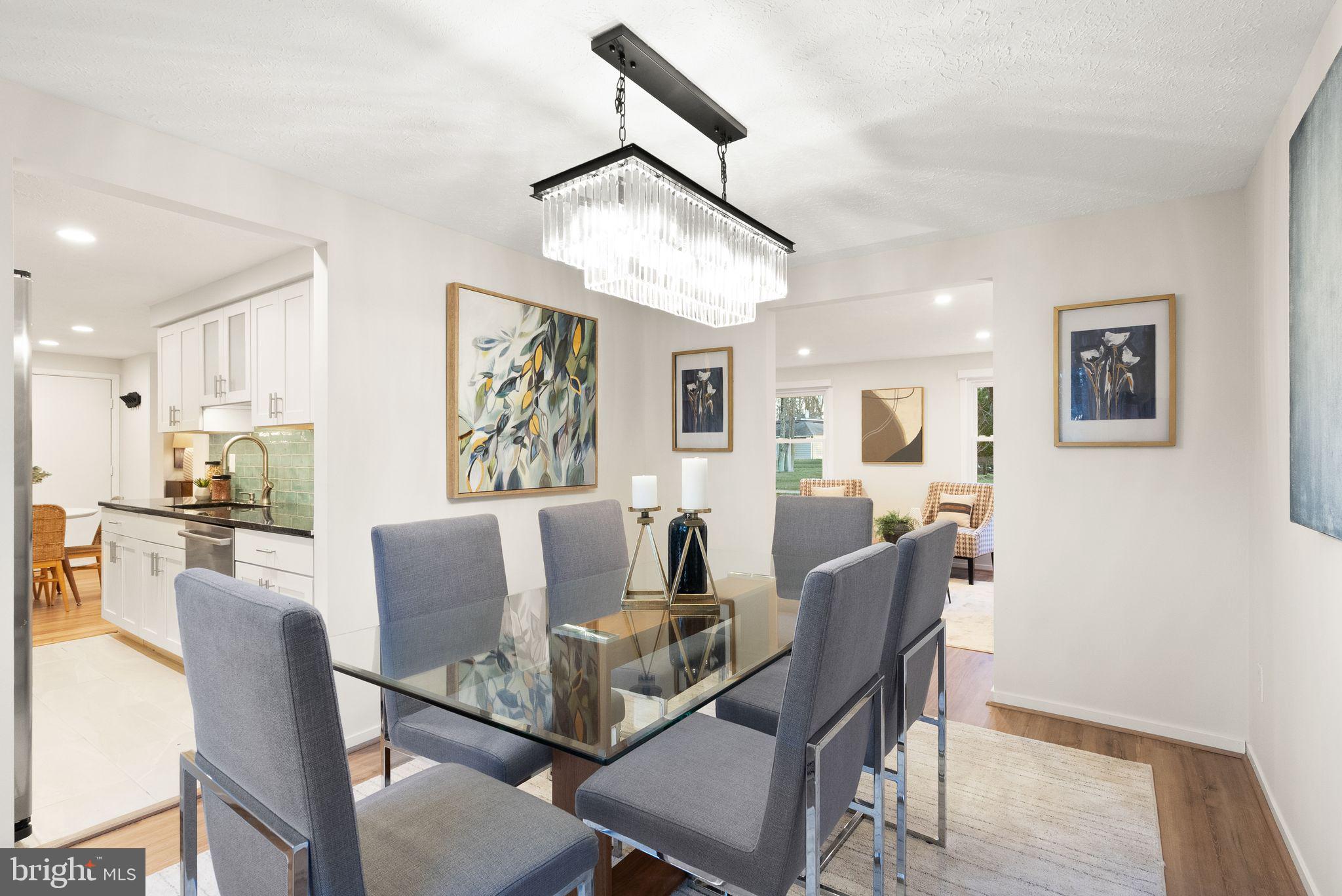 2420 Freetown Drive Reston, VA 20191 - Photo 8 of 58 Restoration hardware chandelier in dining room