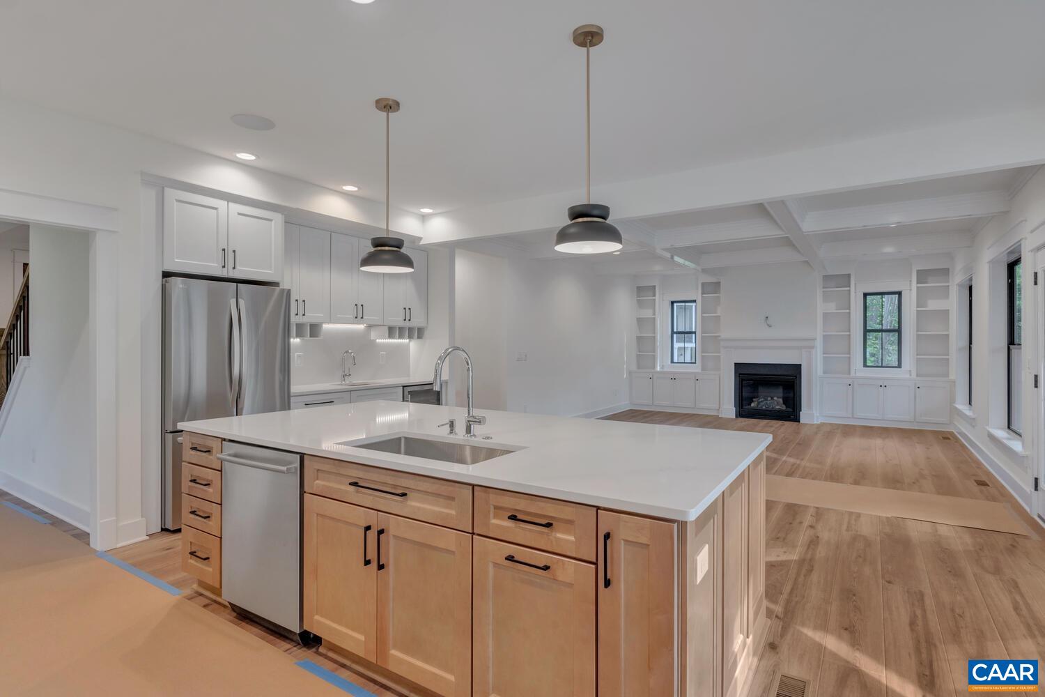 3 Jarmans Gap Road, Unit LOT 3 JARMANS GAP Crozet, VA 22932 - Photo 17 of 39 a kitchen with kitchen island a sink stainless steel appliances and a chandelier