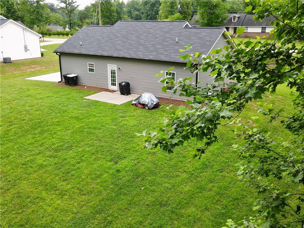 1776 Pleasant Grove Road Temple, GA 30179 - Photo 40 of 45 a view of a house with a backyard