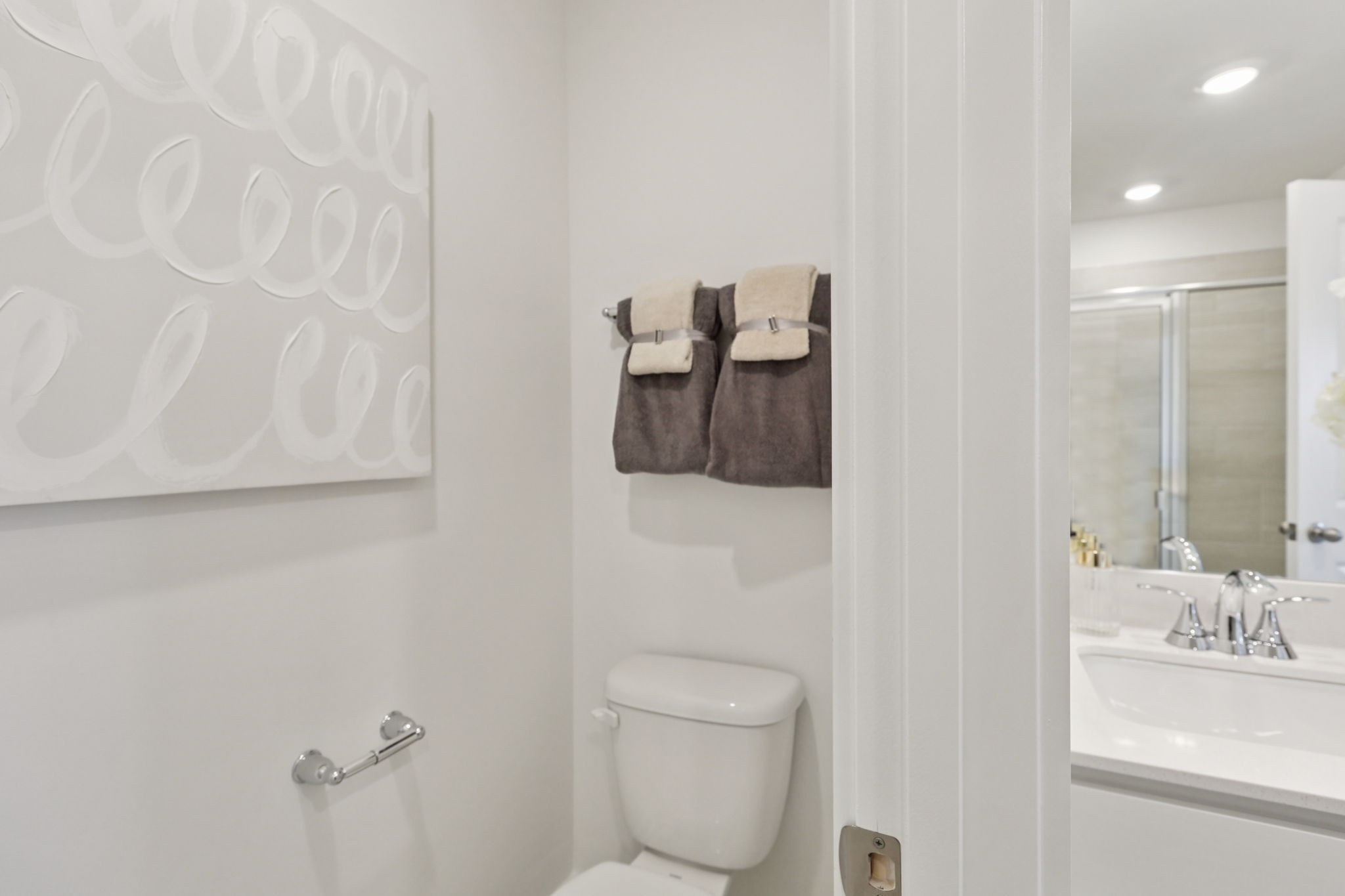 7165 Cedarcrest Lane Fairview, TN 37062 - Photo 39 of 49 a bathroom with a toilet sink and mirror