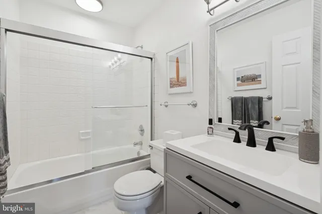 a view of a bedroom with a bed