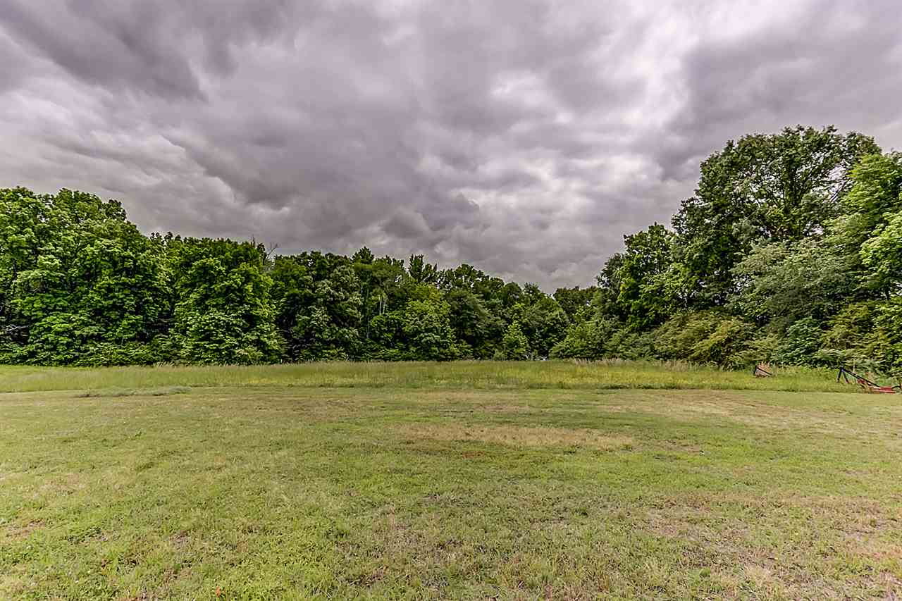9445 Pleasant Ridge Road Lakeland, TN 38002 - Photo 21 of 21 The 5.5 acre home is a rare find ready for you to call home! With a 22x24 metal storage building/workshop area, large 26x50 4 car garage and pool! All of this close to the interstate and located in Lakeland!