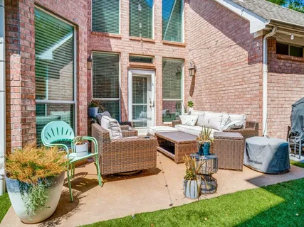 a building outdoor space with patio furniture