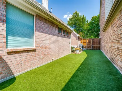 a view of a backyard with a garden