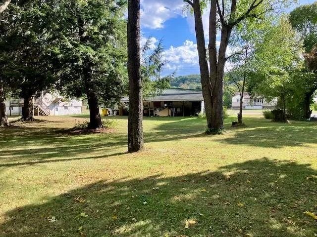 a front view of a house with white door