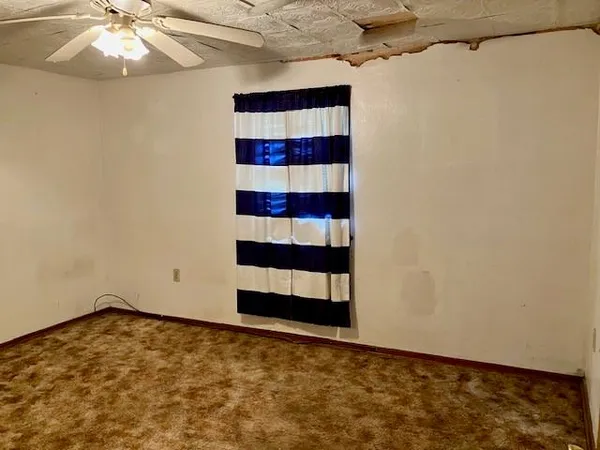 a view of a kitchen with storage and utility