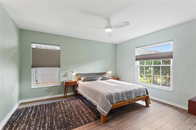 a bathroom with a double vanity sink and mirror