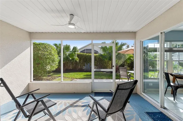 a view of a house with yard and a garage