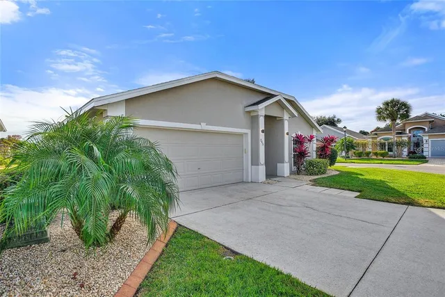 a front view of house with garden