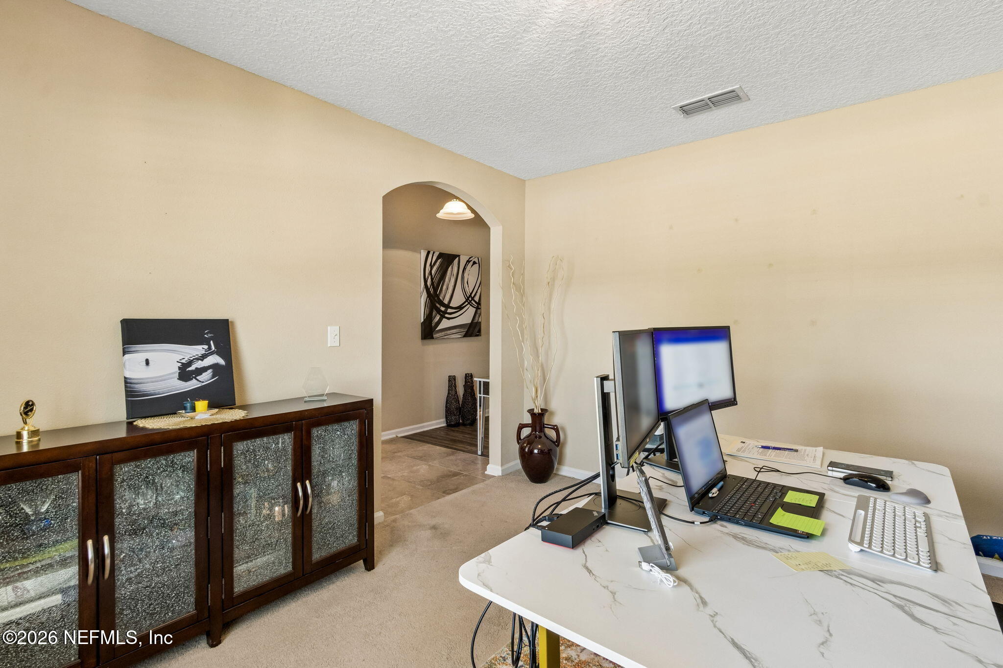 96034 Bass Lane Yulee, FL 32097 - Photo 26 of 50 a bedroom with furniture and a window