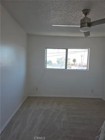 a bathroom with a toilet a sink and bathtub