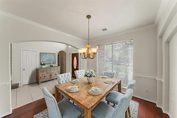 a kitchen with granite countertop a sink and cabinets