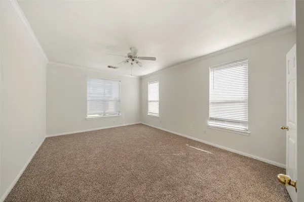 a bed room with a bed and a chandelier