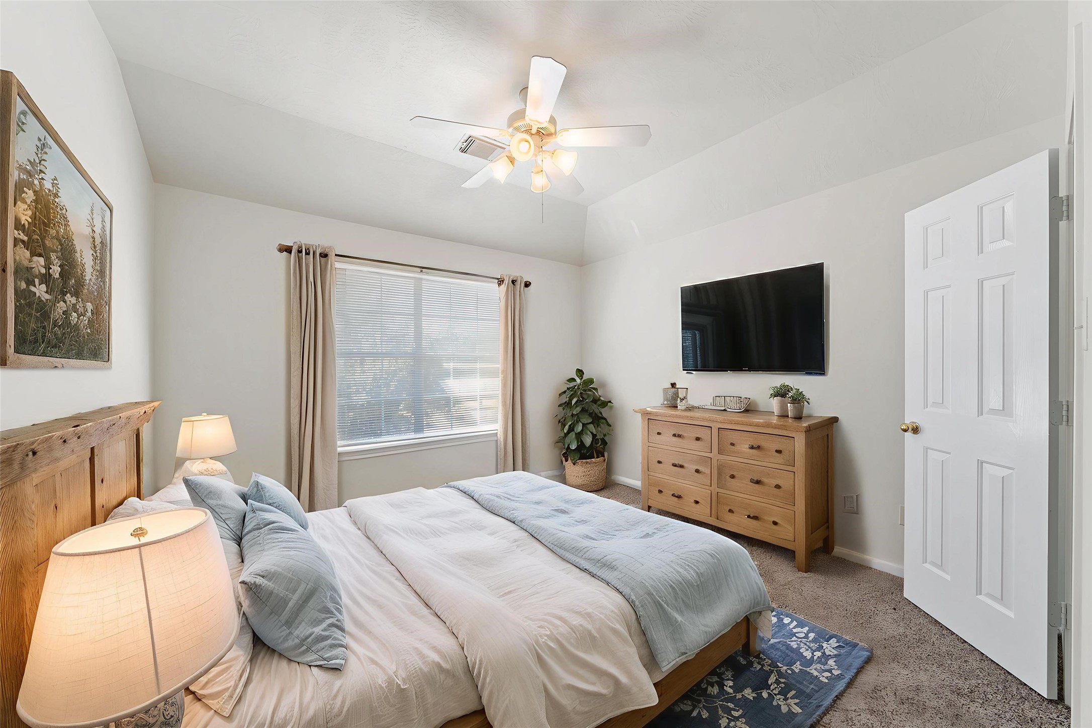 14213 Stone Bluff Lane Rosharon, TX 77583 - Photo 40 of 45 a bedroom with a bed and a flat screen tv