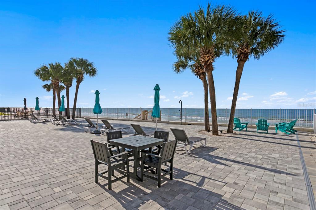 16332 Gulf Boulevard, Unit 3B Redington Beach, FL 33708 - Photo 56 of 93 a view of a backyard with a sitting area