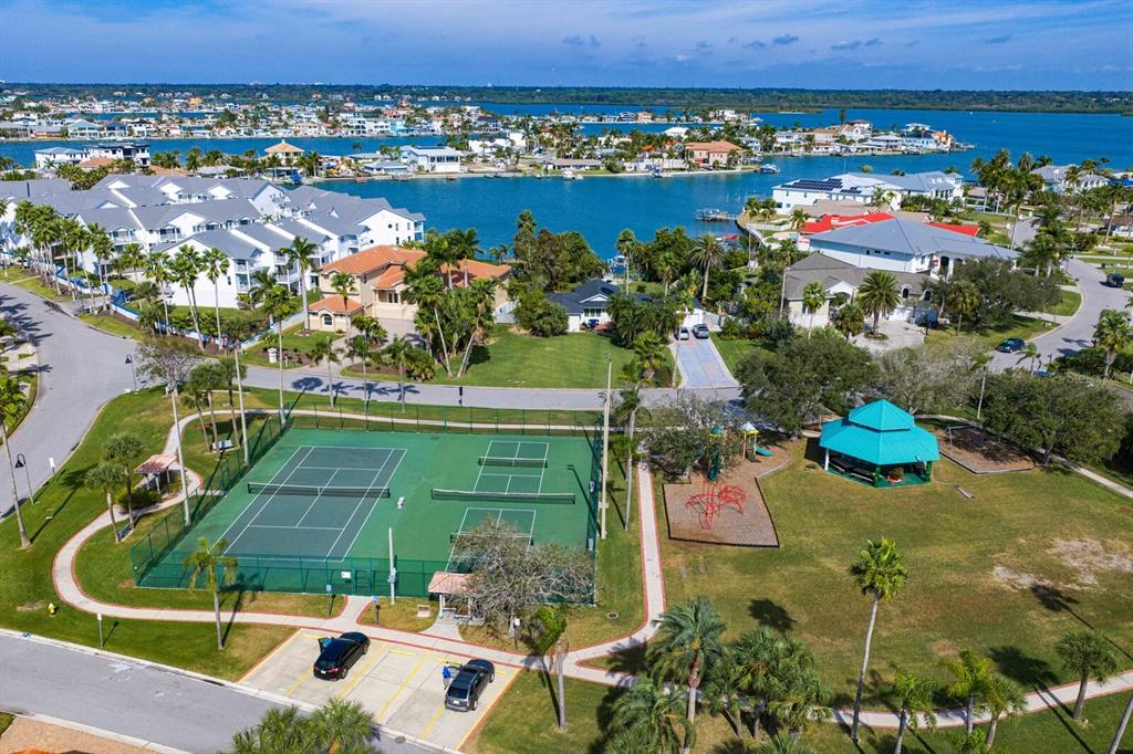 16332 Gulf Boulevard, Unit 3B Redington Beach, FL 33708 - Photo 91 of 93 an aerial view of a house with a yard