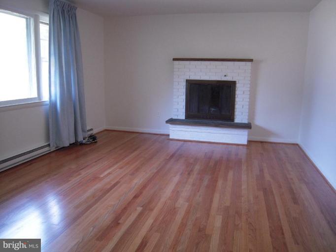 10610 Gorman Road Laurel, MD 20723 - Photo 2 of 20 Full windows with fireplace