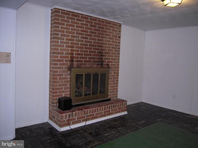 10610 Gorman Road Laurel, MD 20723 - Photo 11 of 20 Fireplace in recreation room