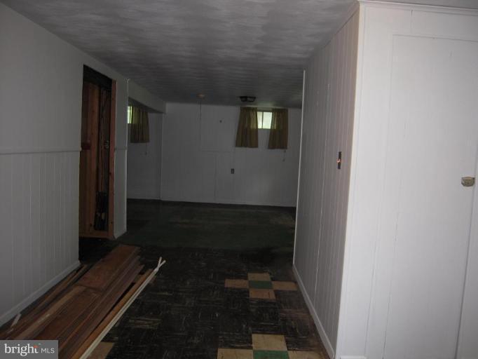 10610 Gorman Road Laurel, MD 20723 - Photo 12 of 20 Wide hallway to recreation room