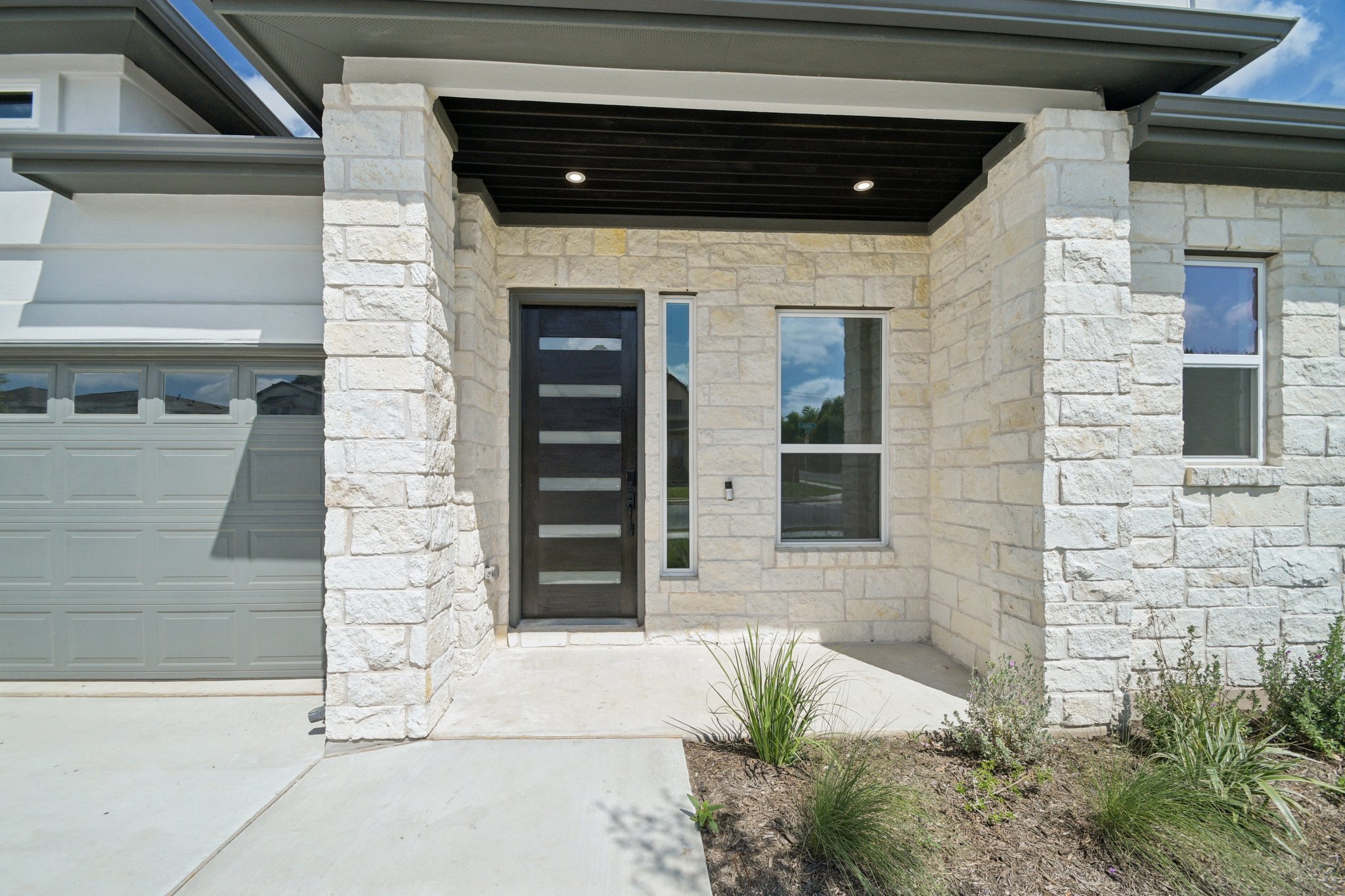 1660 Cardinal Lane Round Rock, TX 78681 - Photo 3 of 35 a potted plant in front of a door
