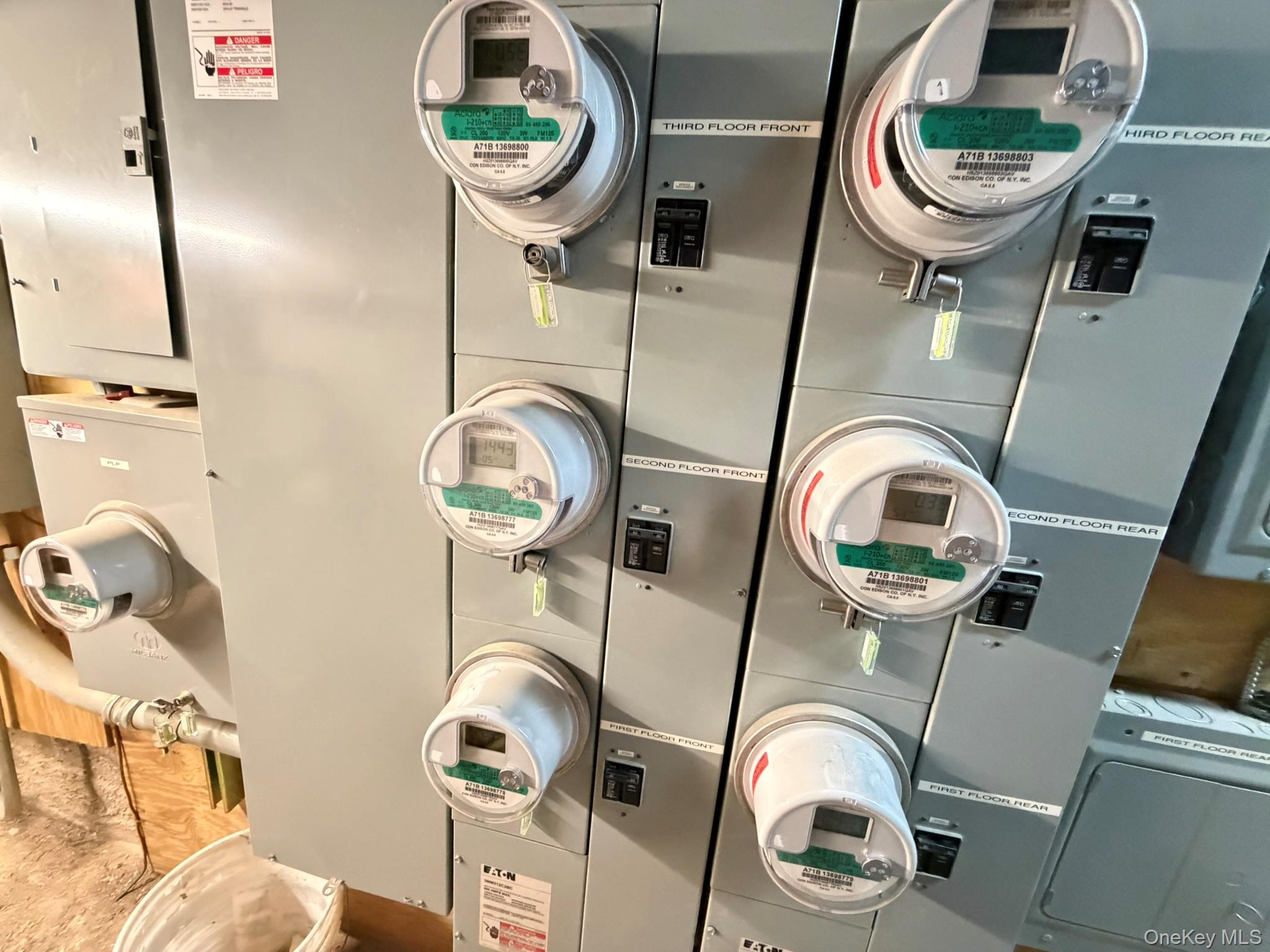 100-04 Spruce Street Queens, NY 11368 - Photo 11 of 12 a close view of light fixtures and washer