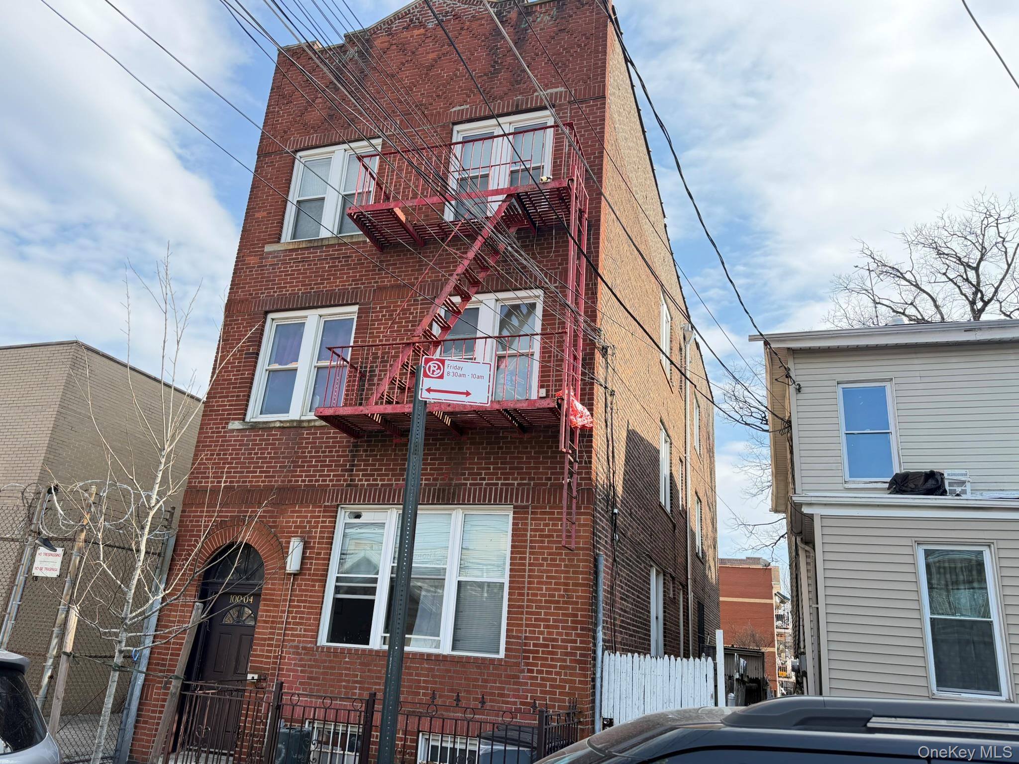 100-04 Spruce Street Queens, NY 11368 - Photo 2 of 12 a front view of a building