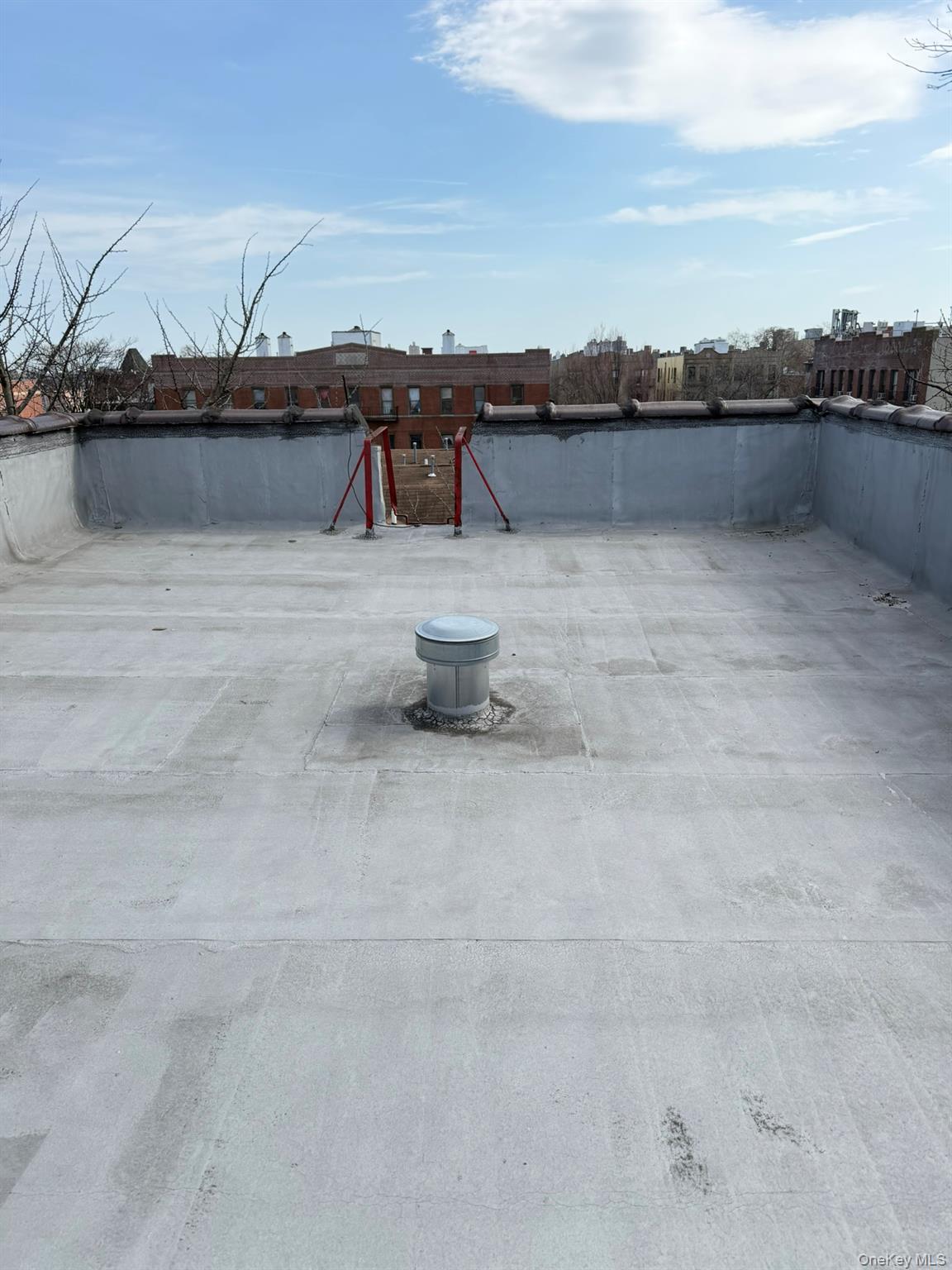 100-04 Spruce Street Queens, NY 11368 - Photo 8 of 12 a view of a lake with a mountain in the background