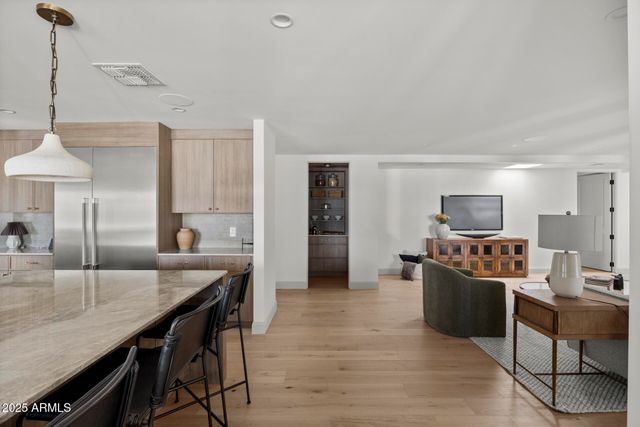 a living room with furniture and a table