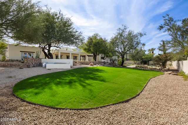 a view of a swimming pool with a garden