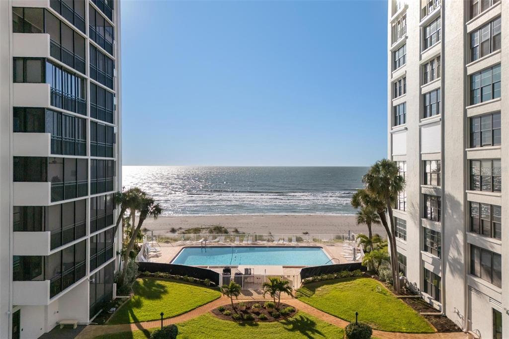 a view of a swimming pool with an outdoor space