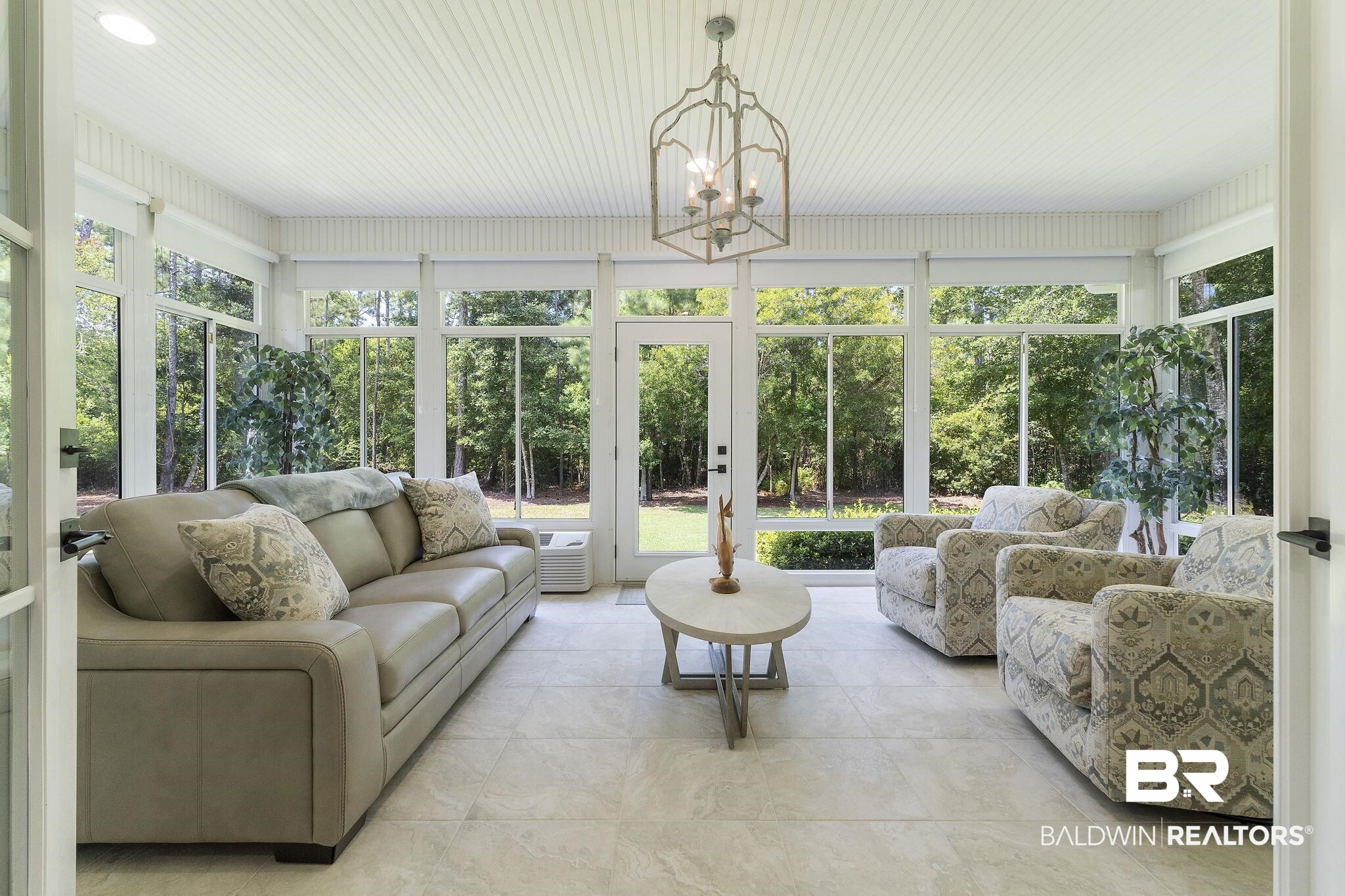 4451 Millhouse Road Gulf Shores, AL 36542 - Photo 10 of 50 Sunroom / solarium with a chandelier