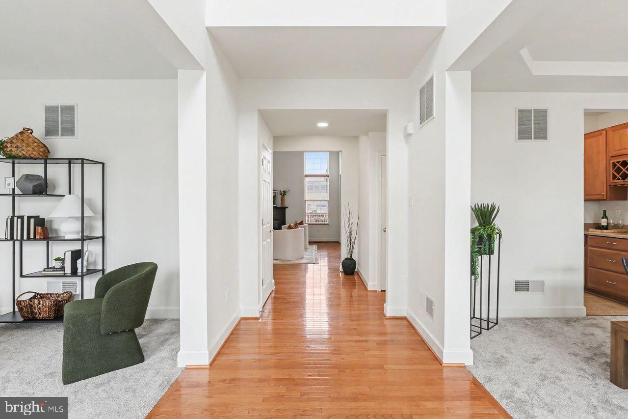 35 Vista Loop Hanover, PA 17331 - Photo 2 of 37 a view of a hallway with wooden floor and furniture