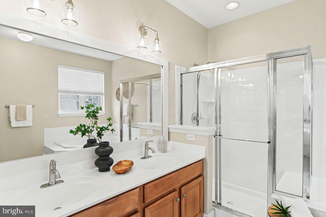 35 Vista Loop Hanover, PA 17331 - Photo 23 of 37 a bathroom with a sink double vanity and a mirror