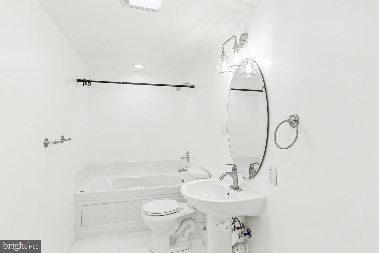 35 Vista Loop Hanover, PA 17331 - Photo 29 of 37 a bathroom with a sink a toilet and shower