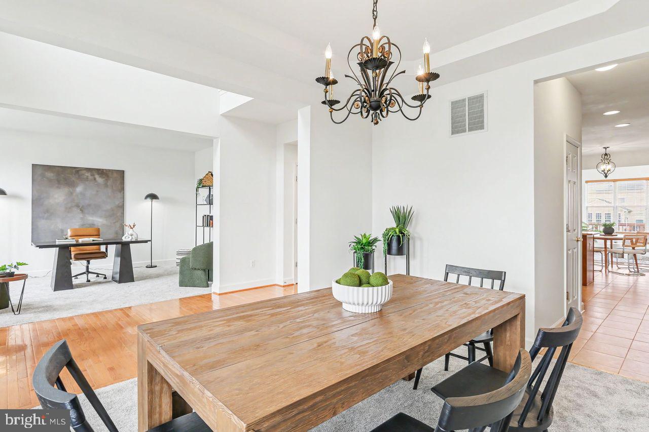 35 Vista Loop Hanover, PA 17331 - Photo 4 of 37 a view of a dining room with furniture and wooden floor