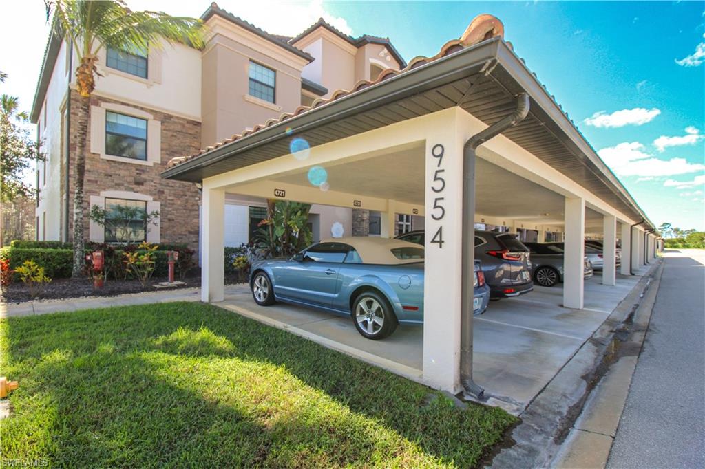 9554 Trevi Court, Unit 4737 Naples, FL 34113 - Photo 3 of 49 a view of a house with a tub and chairs