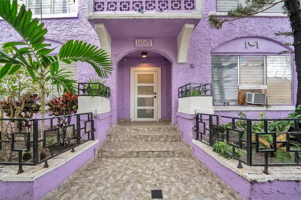 a front view of a house with a porch
