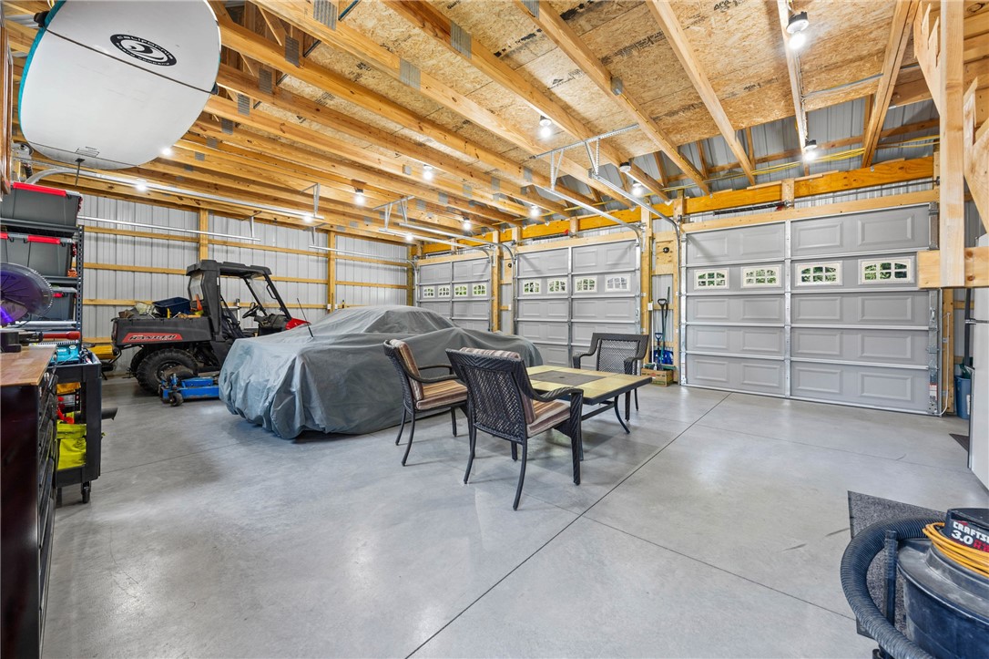 4581 Holley Byron Road Holley, NY 14470 - Photo 37 of 50 Interior of AMAZING 3 car garage