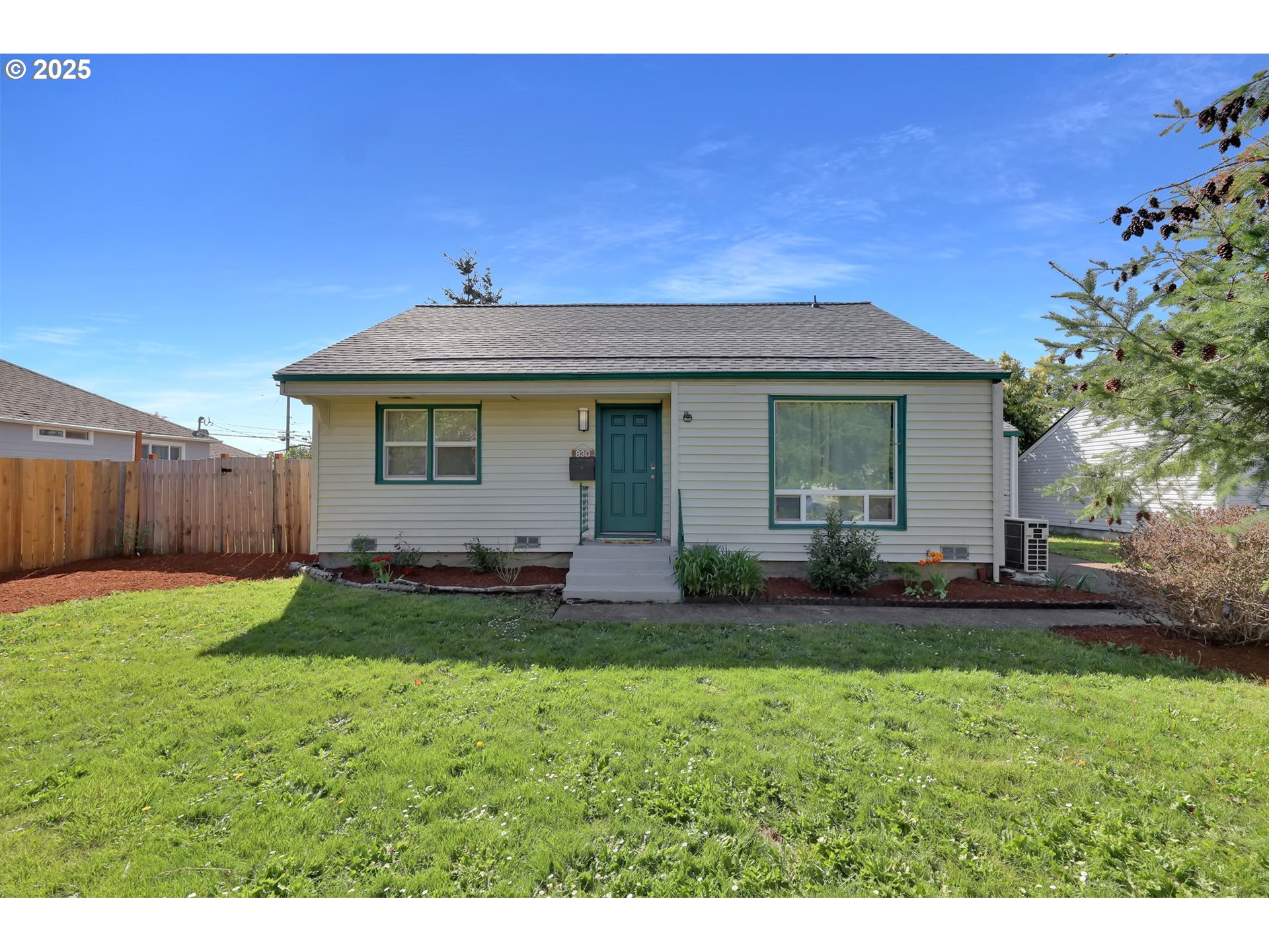 a house view with a backyard space