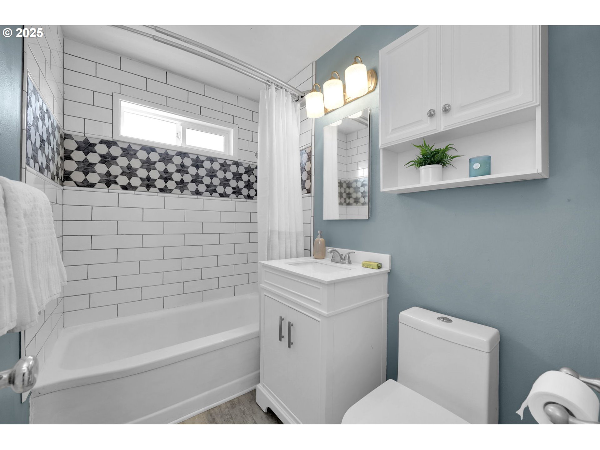 830 Jerry Street Eugene, OR 97402 - Photo 12 of 22 a bathroom with a sink a toilet and shower