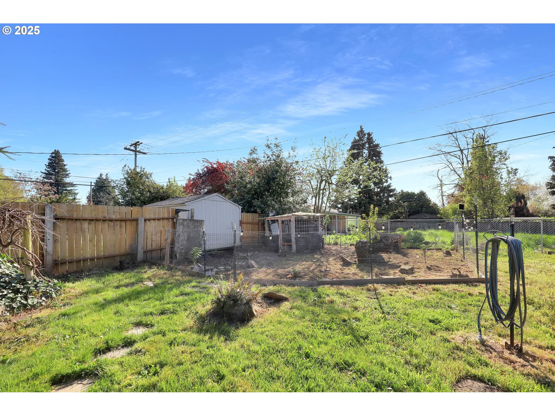 830 Jerry Street Eugene, OR 97402 - Photo 18 of 22 a view of a backyard with wooden fence
